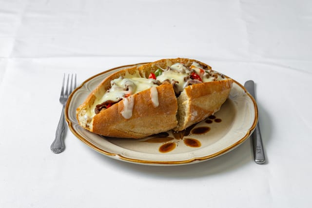 Cheese Steak Deluxe Sandwich.